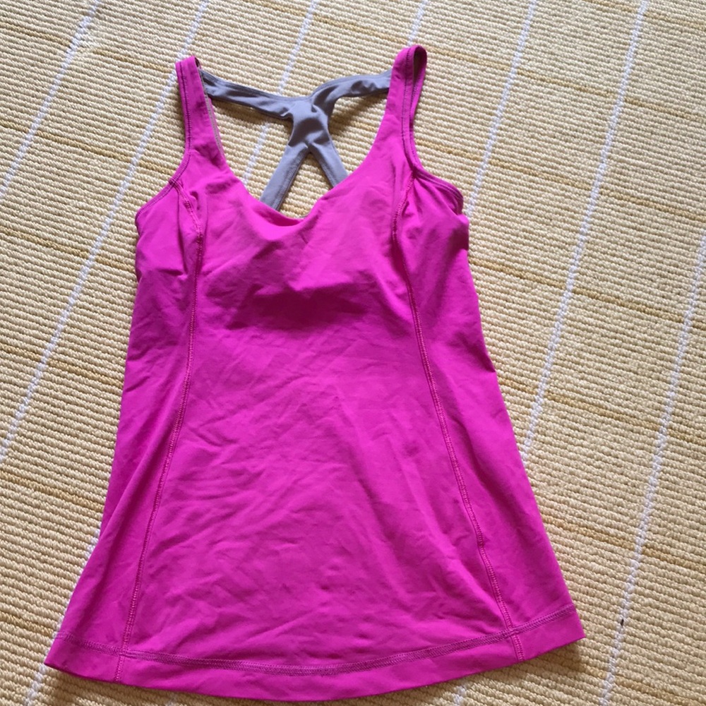 Hot pink lululemon tank top. Grey straps on back